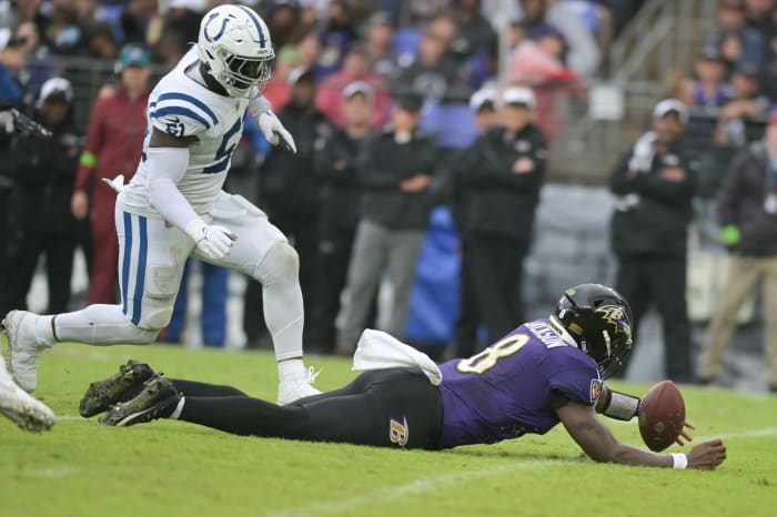 Baltimore Ravens quarterback Lamar Jackson (8) dives for a loose ball against the Indianapolis Colts Sunday at M&T Bank Stadium. The Ravens lost 22-19.